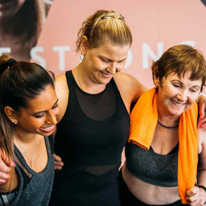 Three Sista Fitness members smiling together